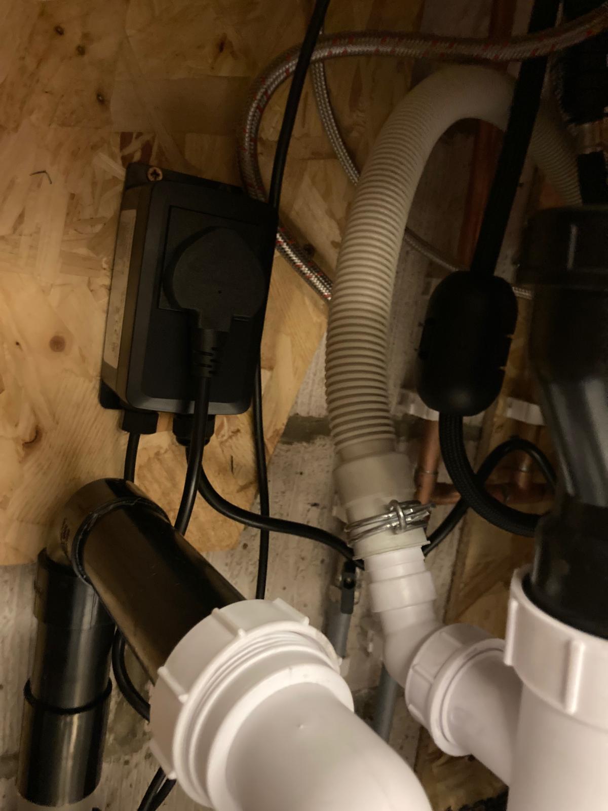 Adapted InSinkErator waste pipework during Quooker installation in Childs Hill