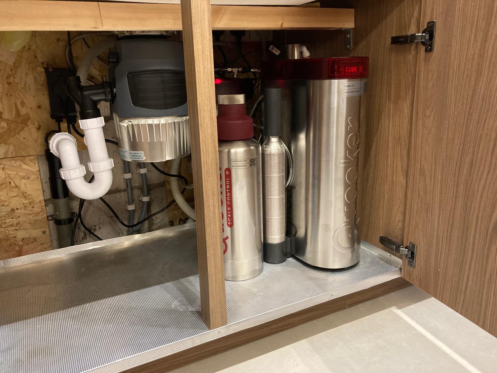 Complete Quooker system and adapted waste connections in NW2 kitchen