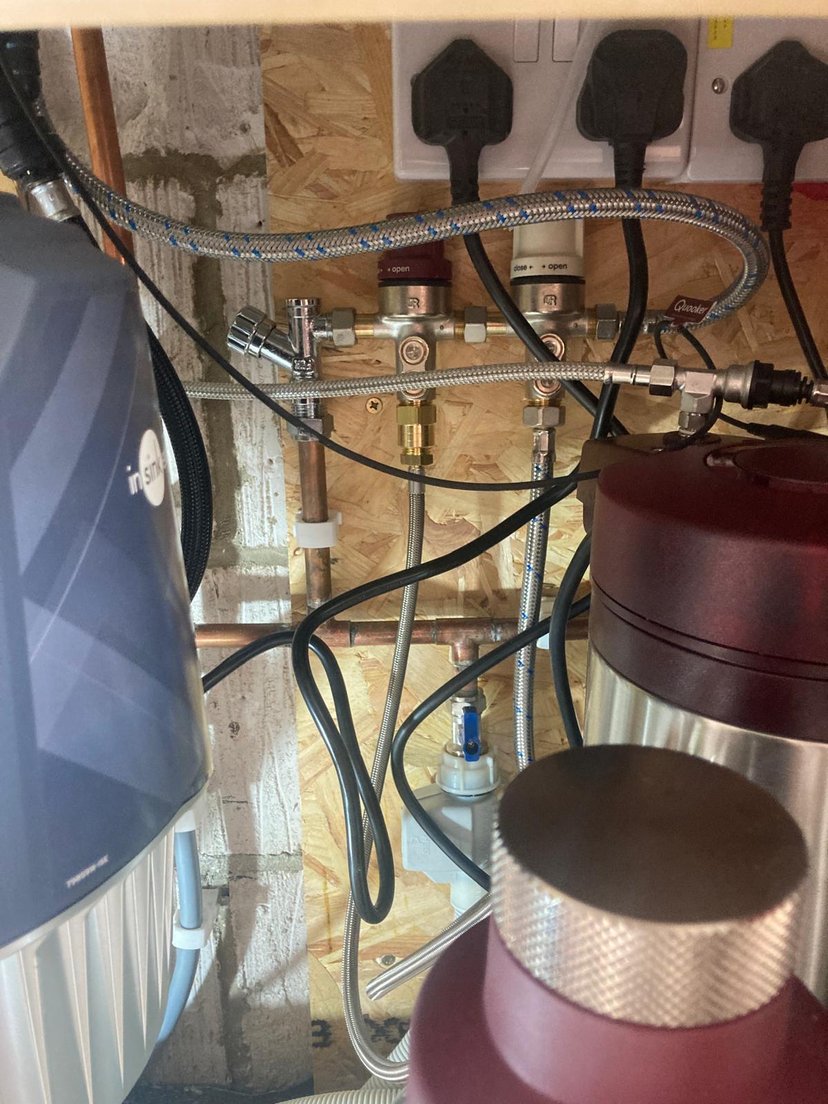 Hot and cold water pipework adapted for Quooker installation