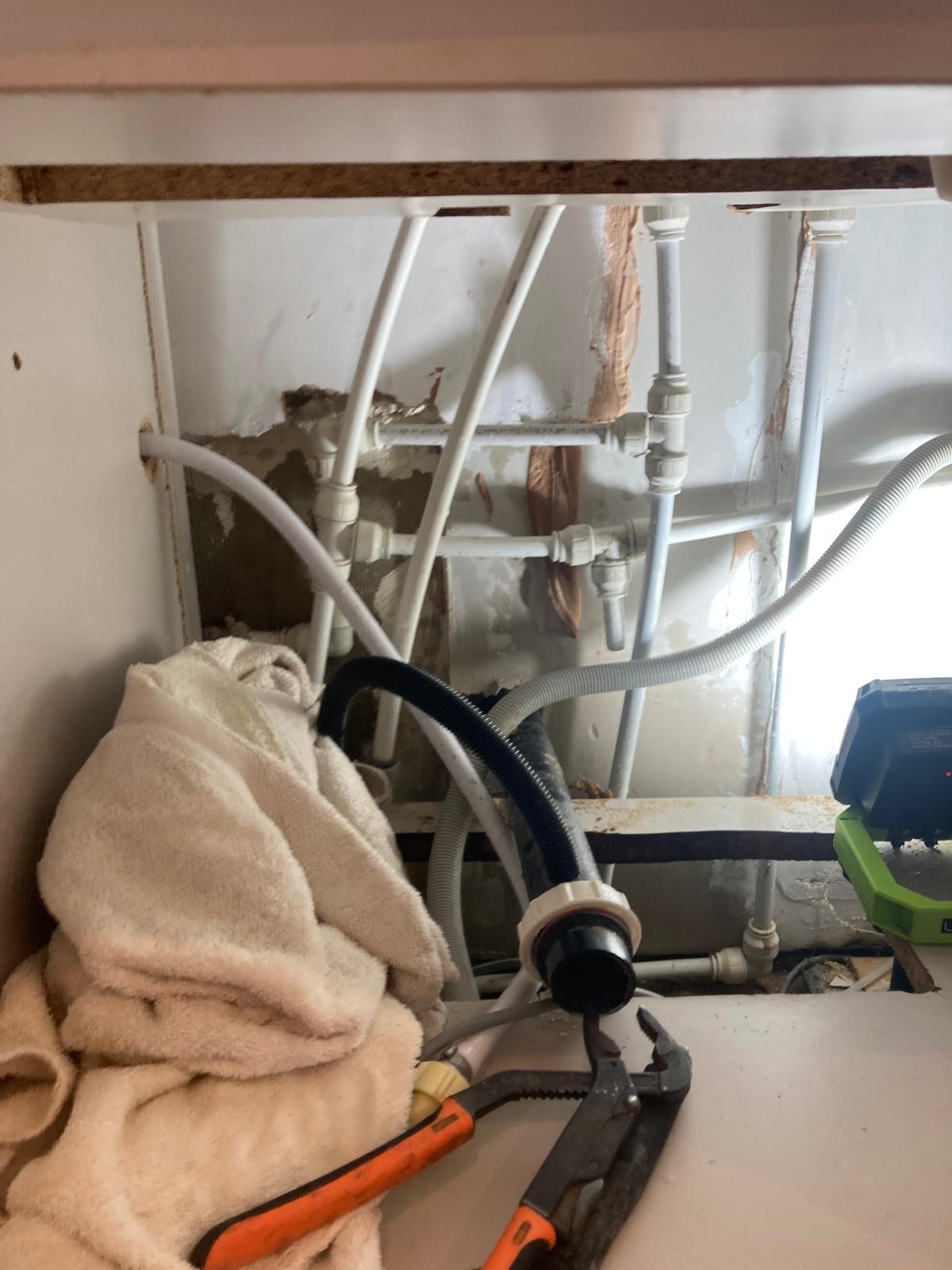Quooker components removed to access pipework during leak repair in Stevenage