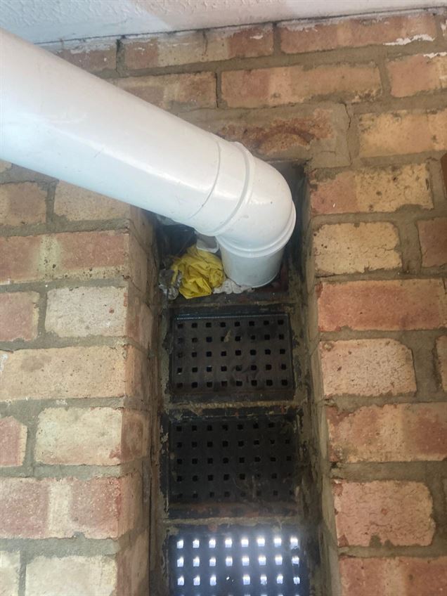 Poorly sealed boiler flue wall penetration in Stevenage
