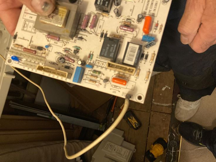 Printed circuit board removed during diagnosis of the old Baxi boiler