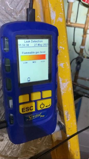 Gas detector displaying a flammable gas level indication during the Mill Hill boiler inspection