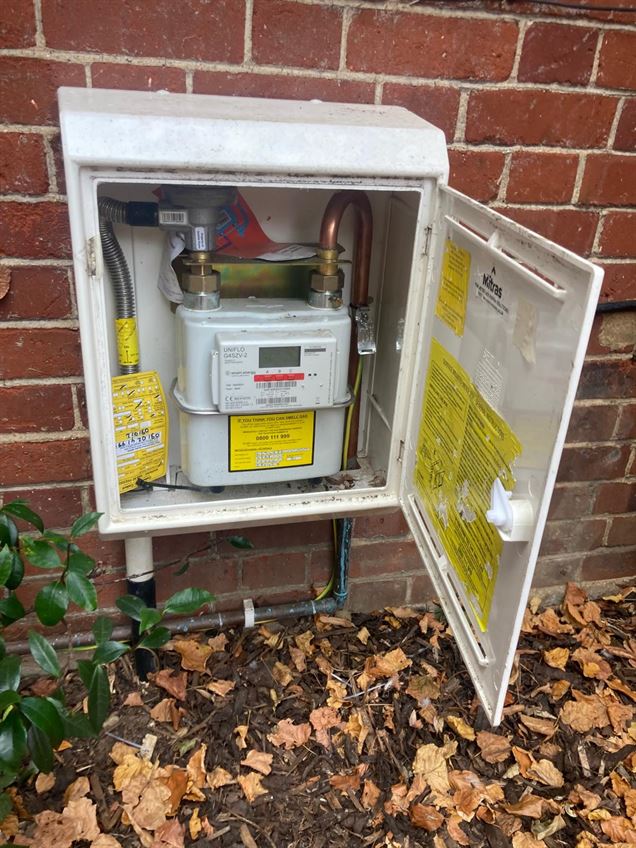 Open external gas meter cabinet at the Bushey property