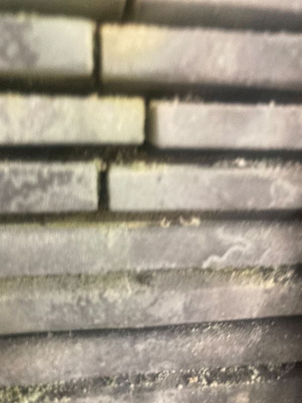 Close-up of deposits on the Worcester Bosch boiler heat exchanger