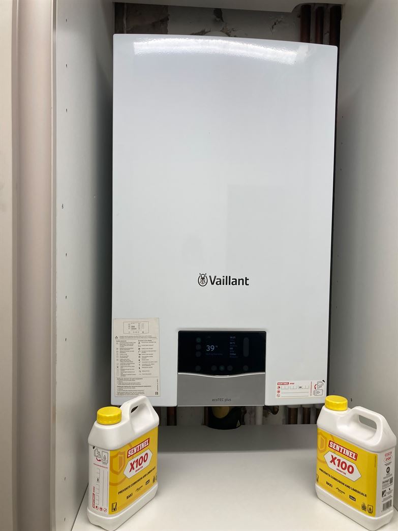 Vaillant ecoTEC Plus 635 installed inside a tall utility unit in Radlett WD7
