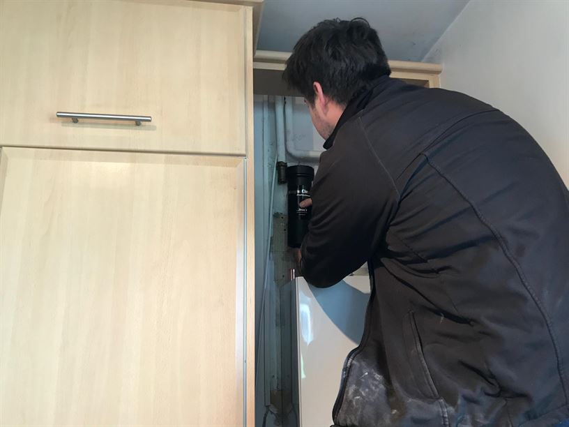 Engineer working on the replacement boiler installation in Pinner